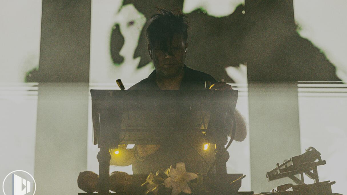 Trentemøller on stage behind his synths